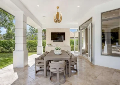 Elegant outdoor dining area professionally enhanced with HDR blending for natural light balance.