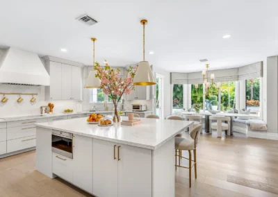 Spacious open kitchen and dining area with HDR blending, window view pull, and natural lighting.