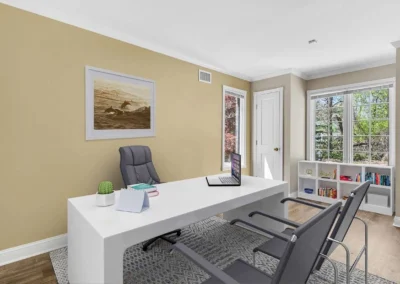 Professional virtual staging of a modern home office space to help buyers visualize a functional workspace.